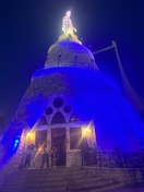 Social Event  Illumination of Our Lady of Lebanon Shrine in Harissa in blue Lebanon