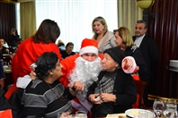 Hilton  Sin El Fil Social Event Hilton Beirut Metropolitan Palace's Christmas lunch for the elderly people Lebanon